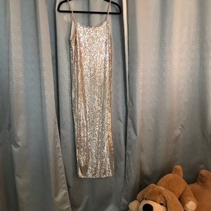 Silver sequin sheath from Neiman Marcus. Adjustable straps, great for parties